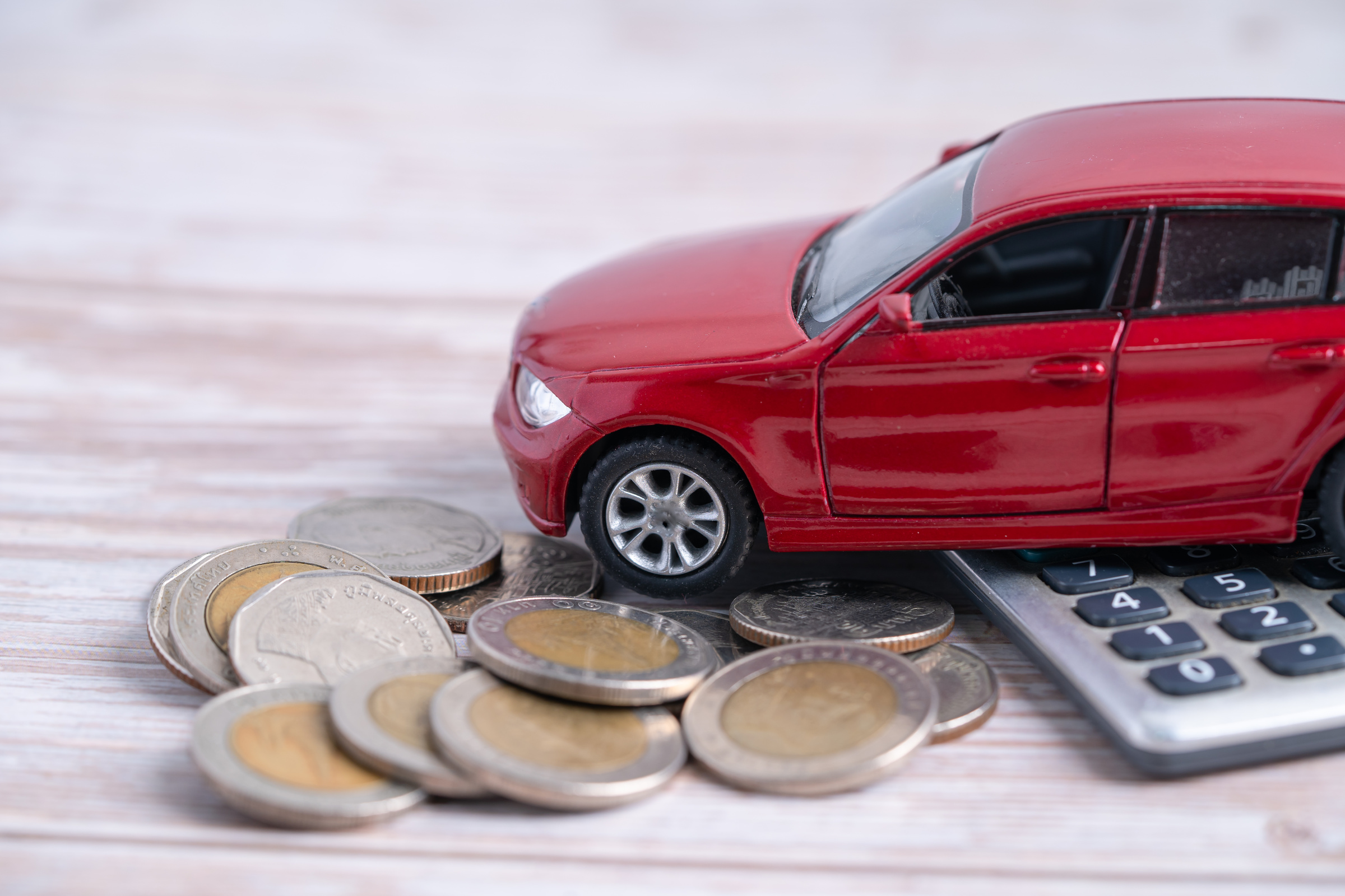 Car on Stack of Coins. Car Loan, Finance, Saving Money, Insuranc